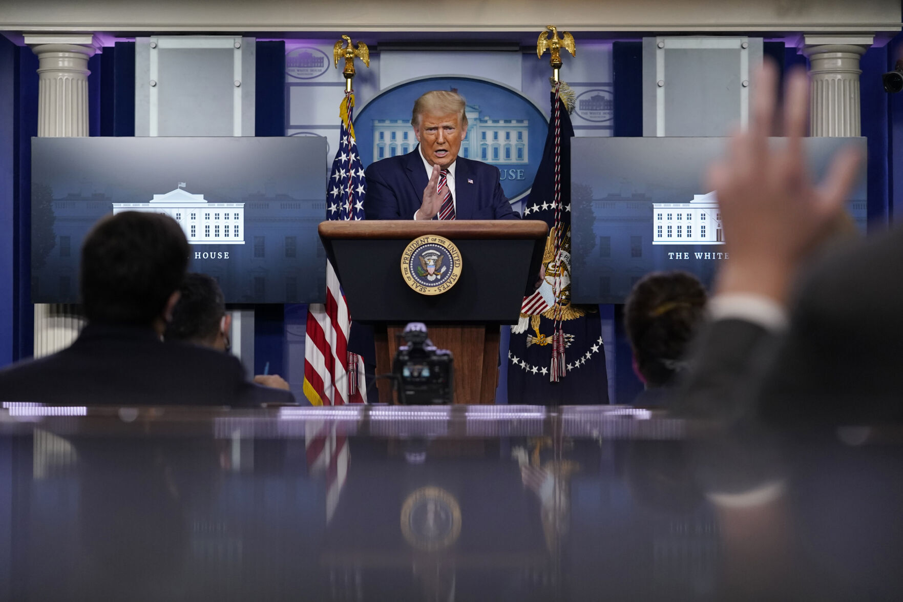 Sunday: Trump holds news conference